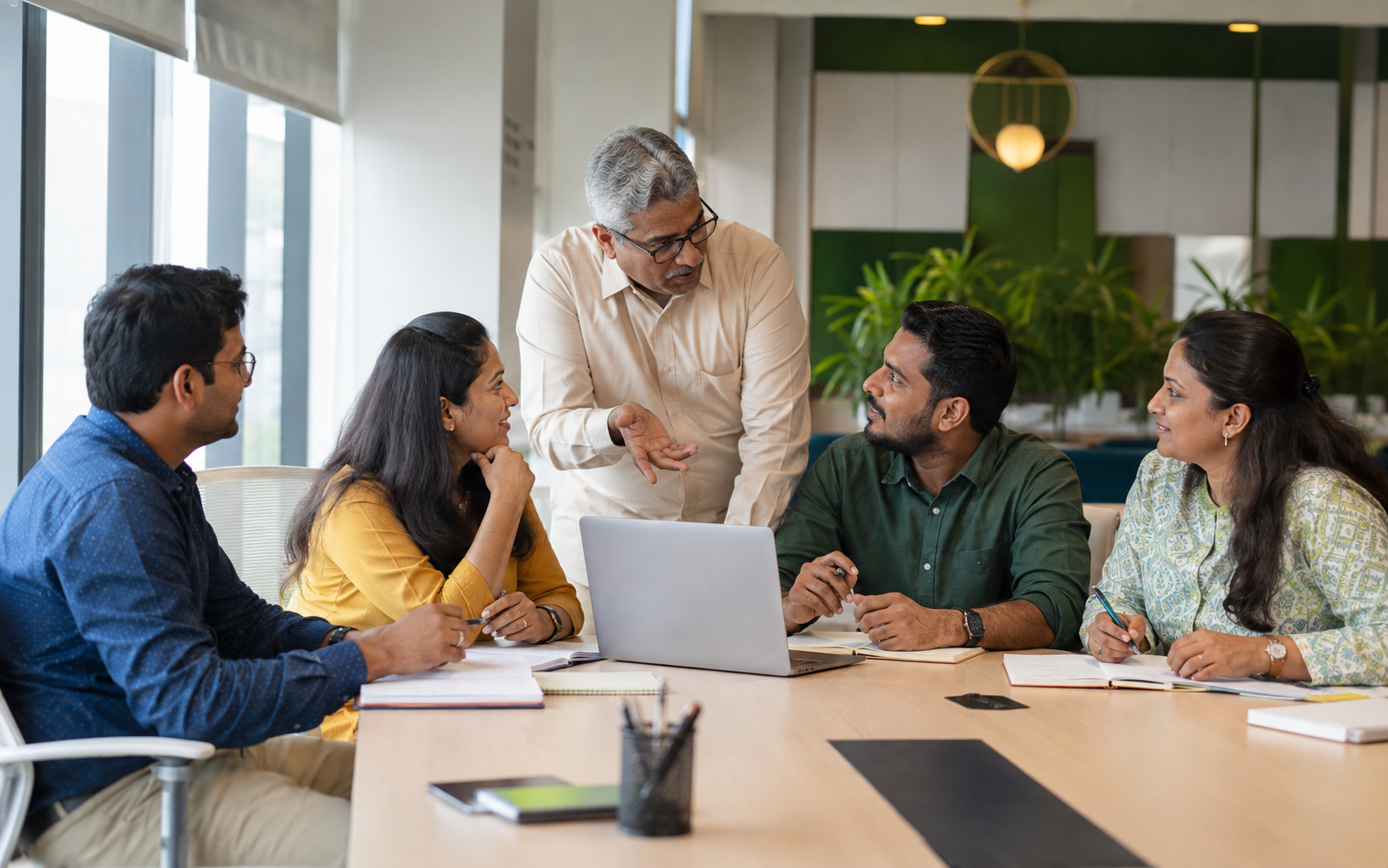 Indian financial advisors collaborating in a professional workshop